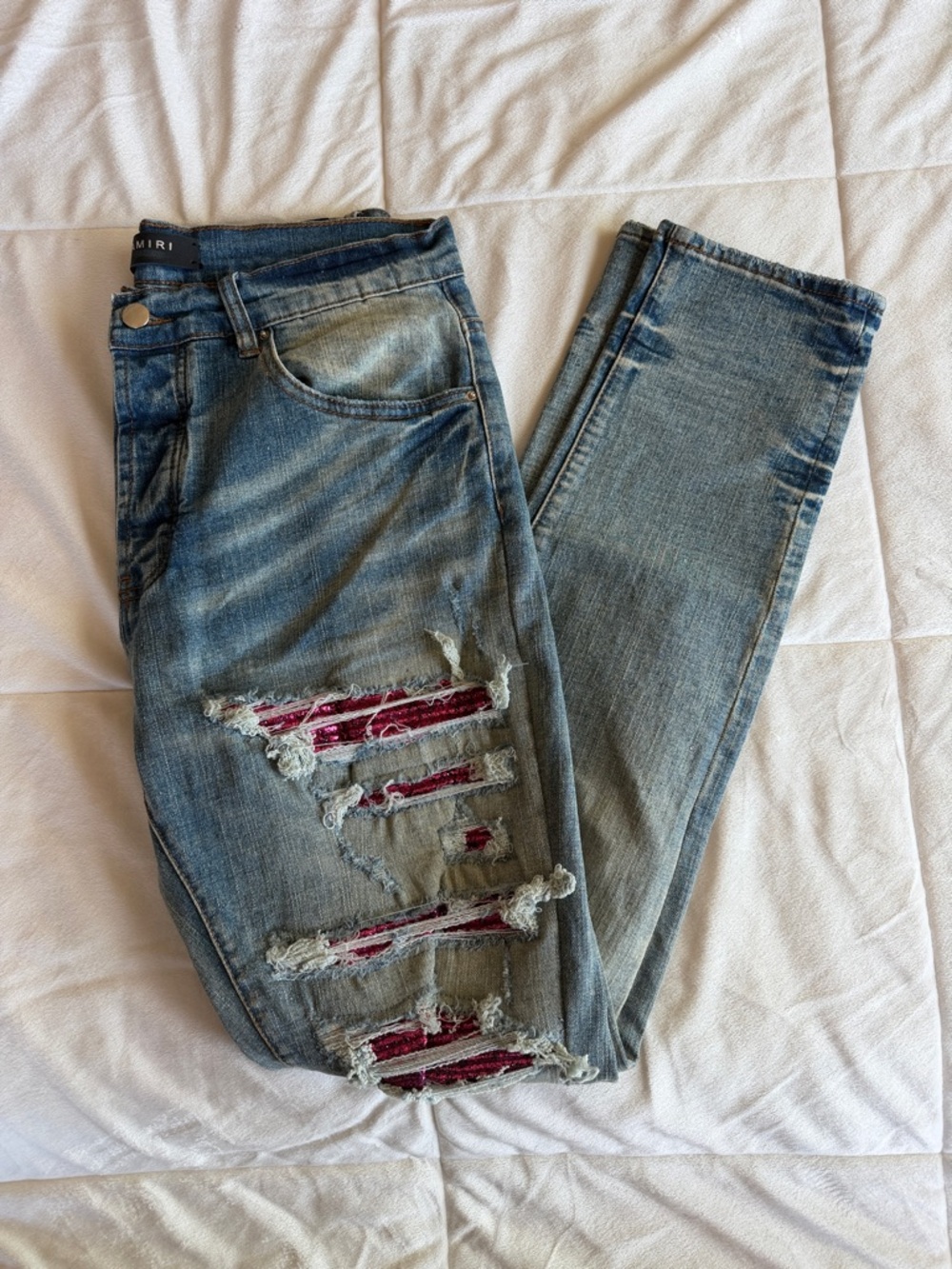 AMIRI Blue Denim Jeans with Pink Patches